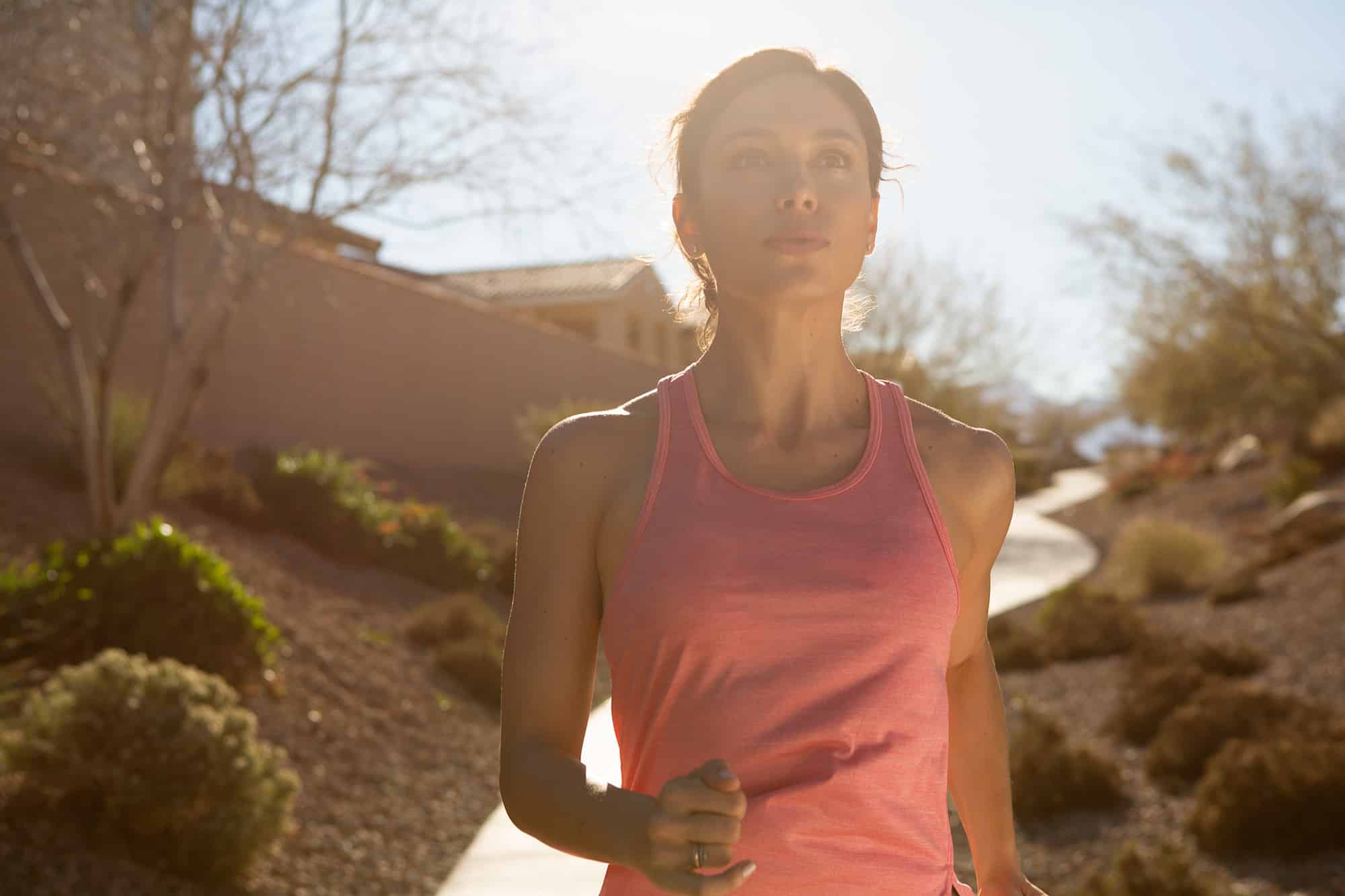Woman jogging in a pink shirt in Summerlin