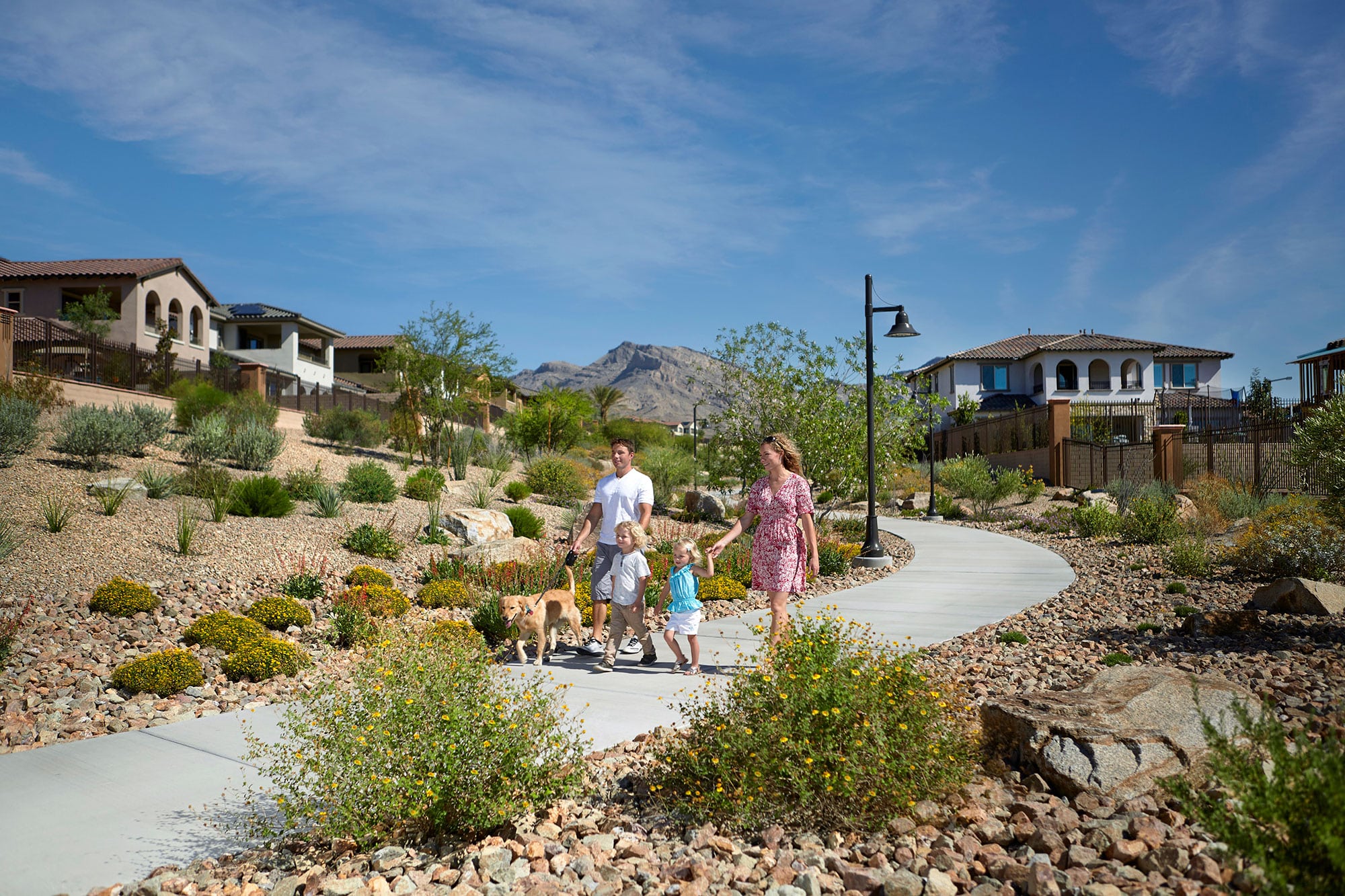 Family walking on the trail system in summerlin