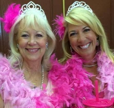 Fafie Moore and Tanya Murray in Pink boas