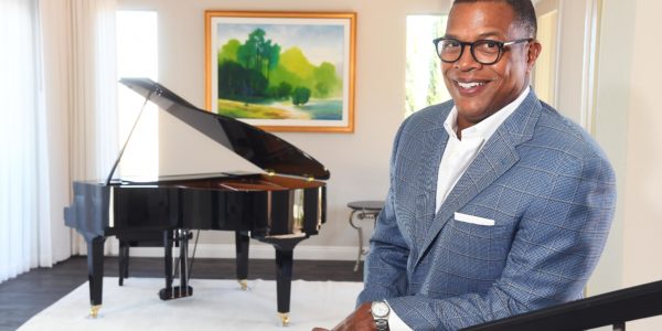 Derrick Hill in his paino room