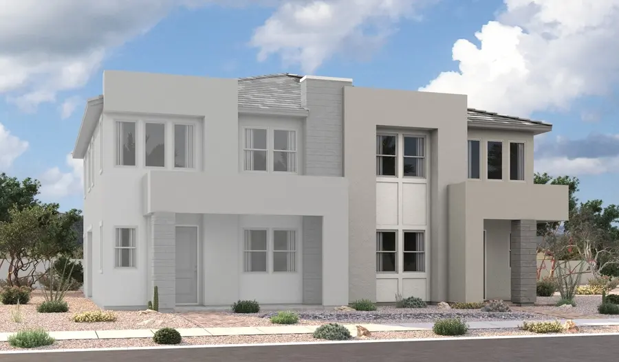 Navy-1-Elevation-C Modern two-story house with a flat roof, large windows, and a clean, geometric design. The exterior is white and light gray with desert landscaping, including rocks and small shrubs, under a partly cloudy sky.